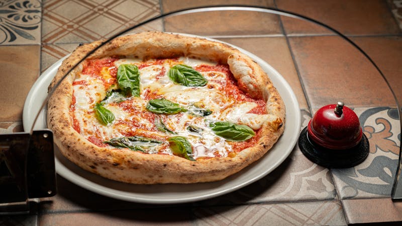 Freshly made seasons pizza slice